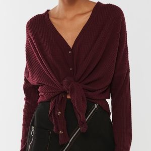 Red button lounge sweater from Urban Outfitters